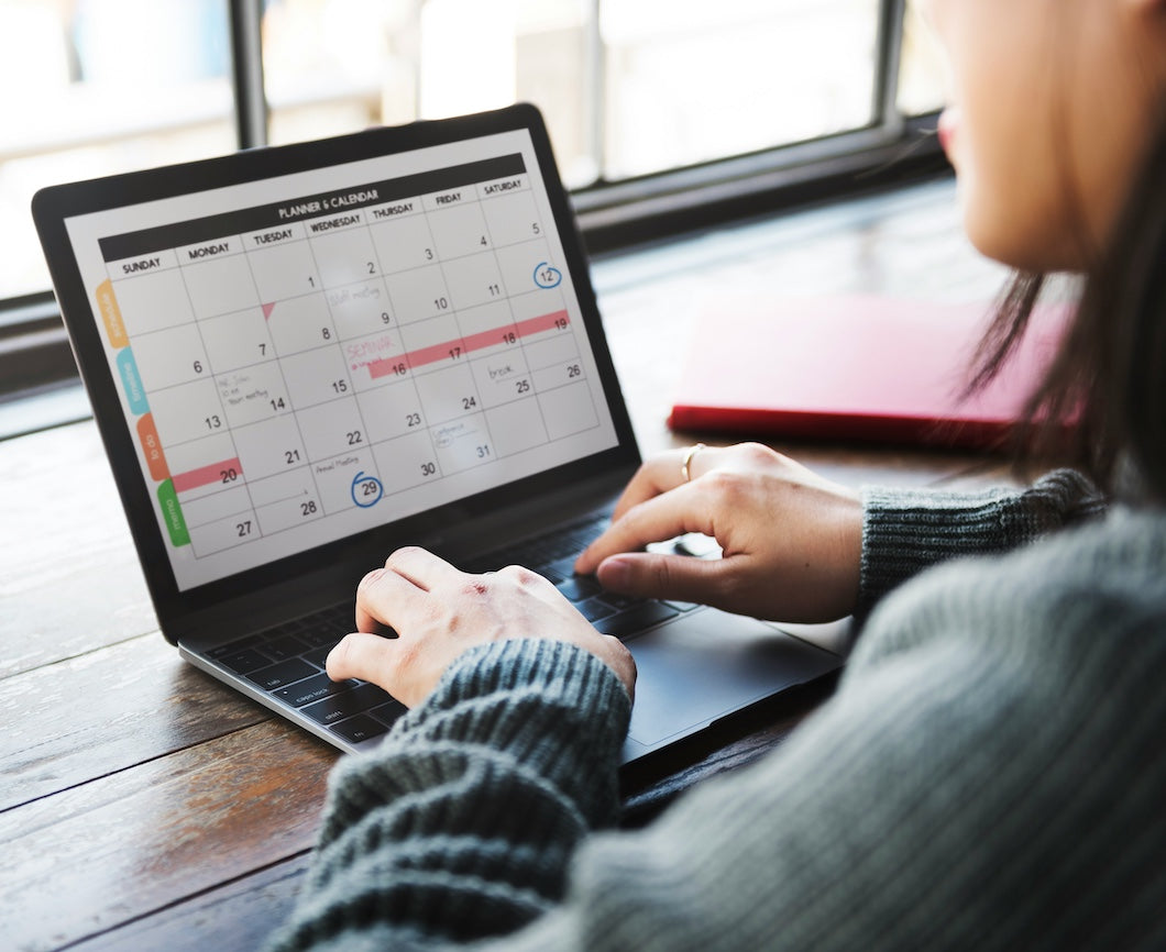 Wedding planning calendar on a laptop