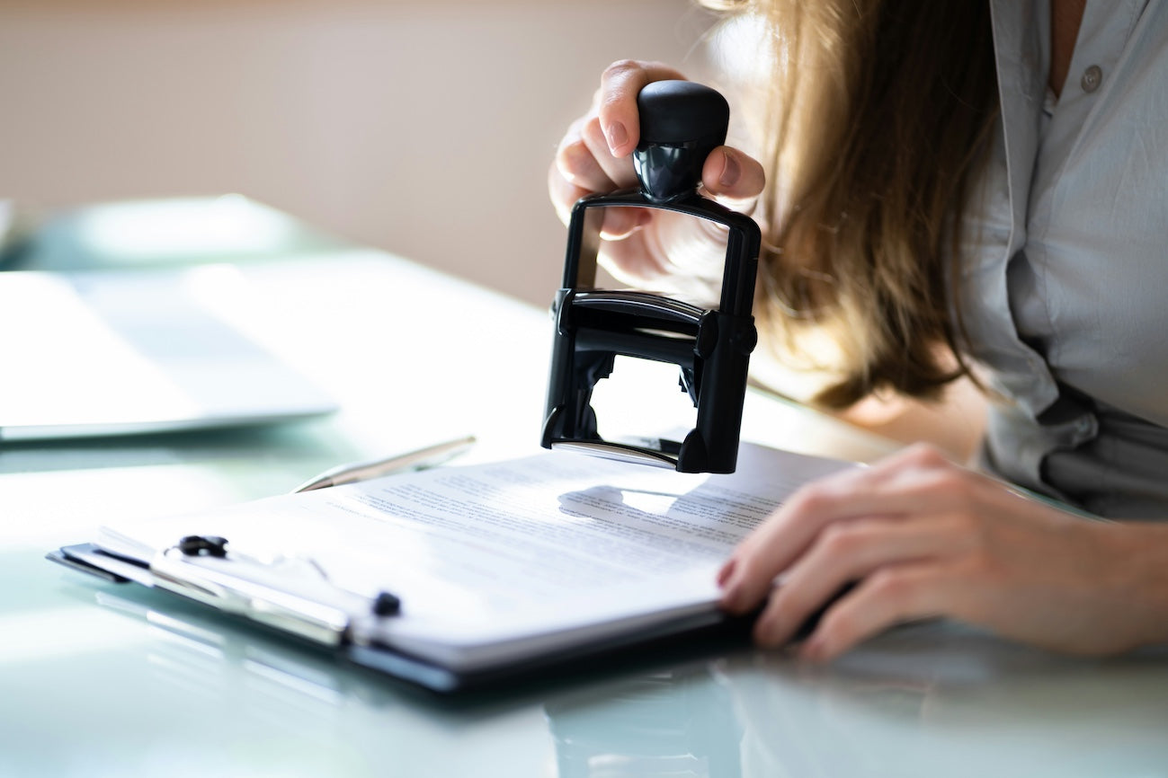 Wedding vendor planning notes and camera